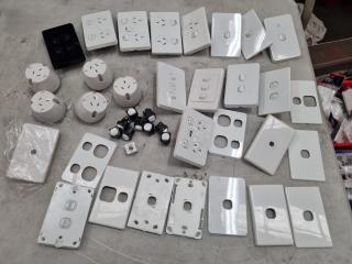 Assorted Electrical Wall Switches and Power Outlets