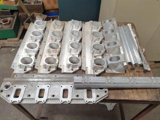 Assorted Aftermarket V8 Inlet Manifold Adapters and Parts