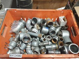 Bin of Stainless Pipe Fittings