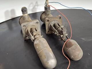 Pair of mechanical float valves