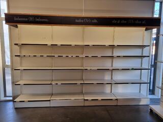 Wall Mounted Lighted Retail Shelving Assembly