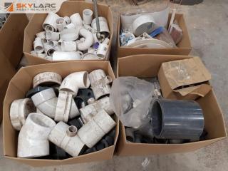 4 Boxes of Plastic Pipe Fittings