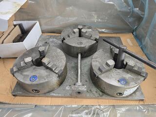 Three Chucks Mounted on Steel Plate