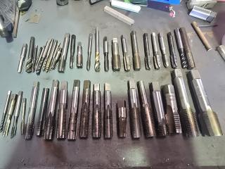 Large Lot of Taps 